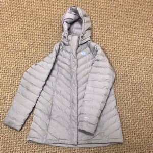 3/4 length grey down coat.